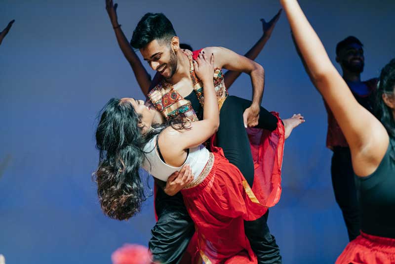 Two students dancing