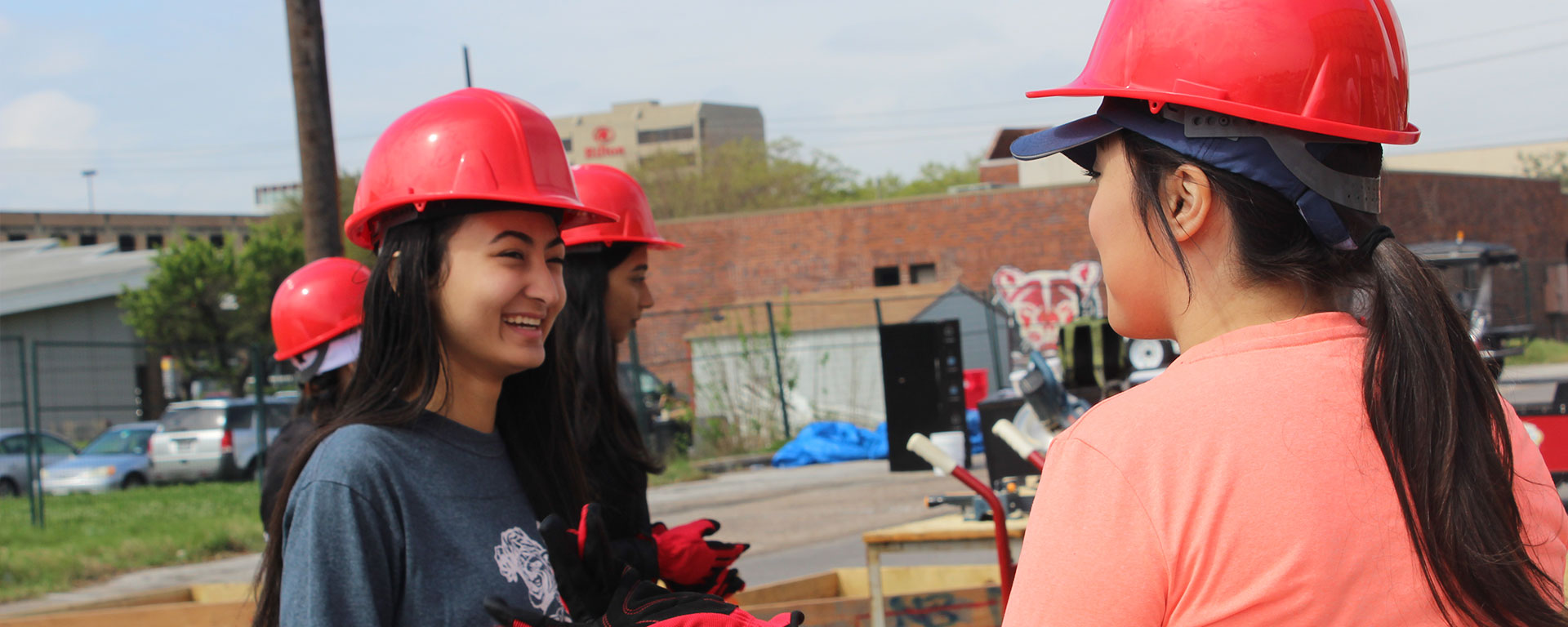 volunteers in hardhats