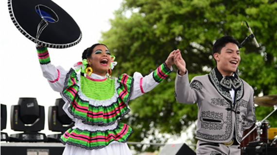 Performers holding hands