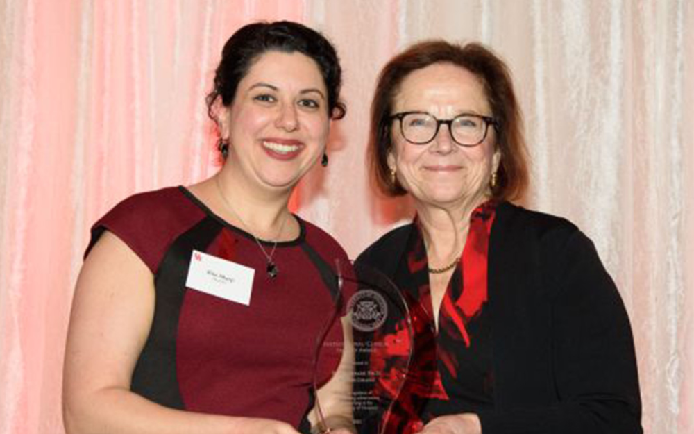 Professor Rita Sharp accepting an award