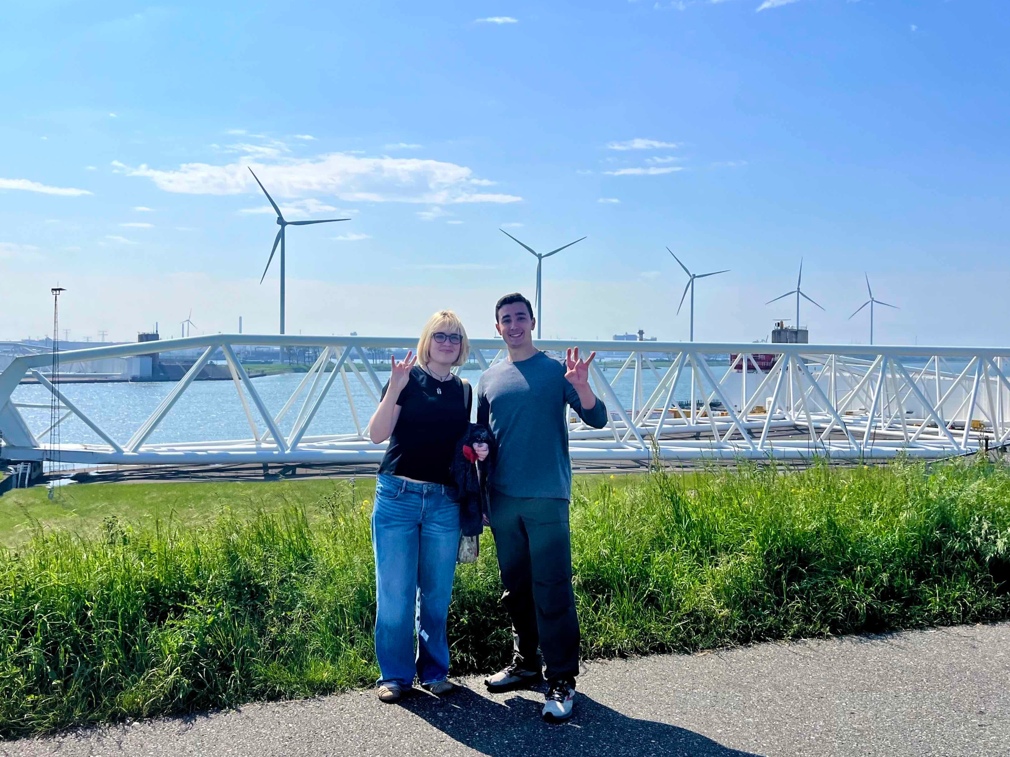 students in front of turbines