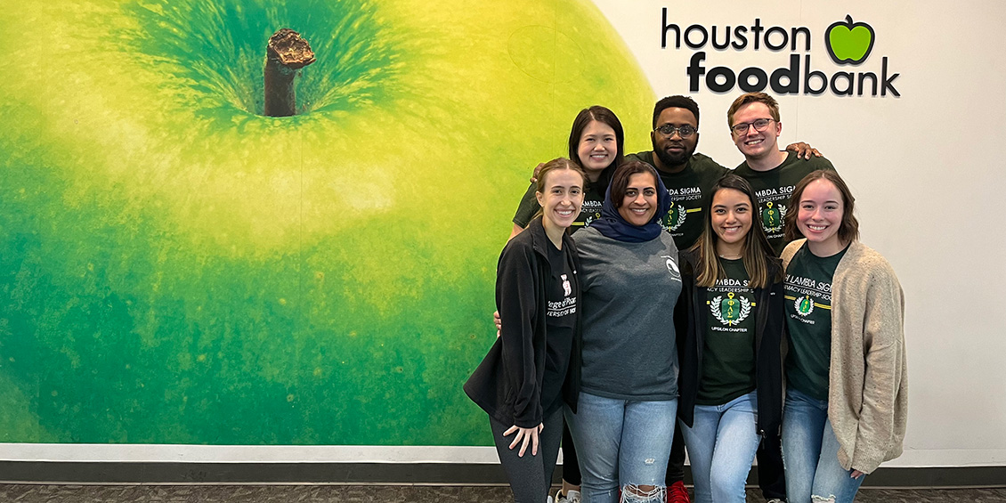 Members of PLS volunteer at the Houston Food Bank.