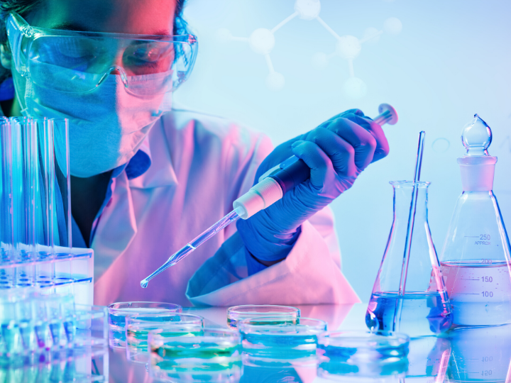 Researcher pipetting in lab